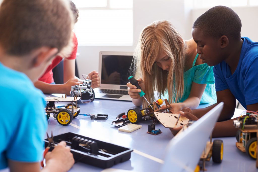 Student after school computer coding class
